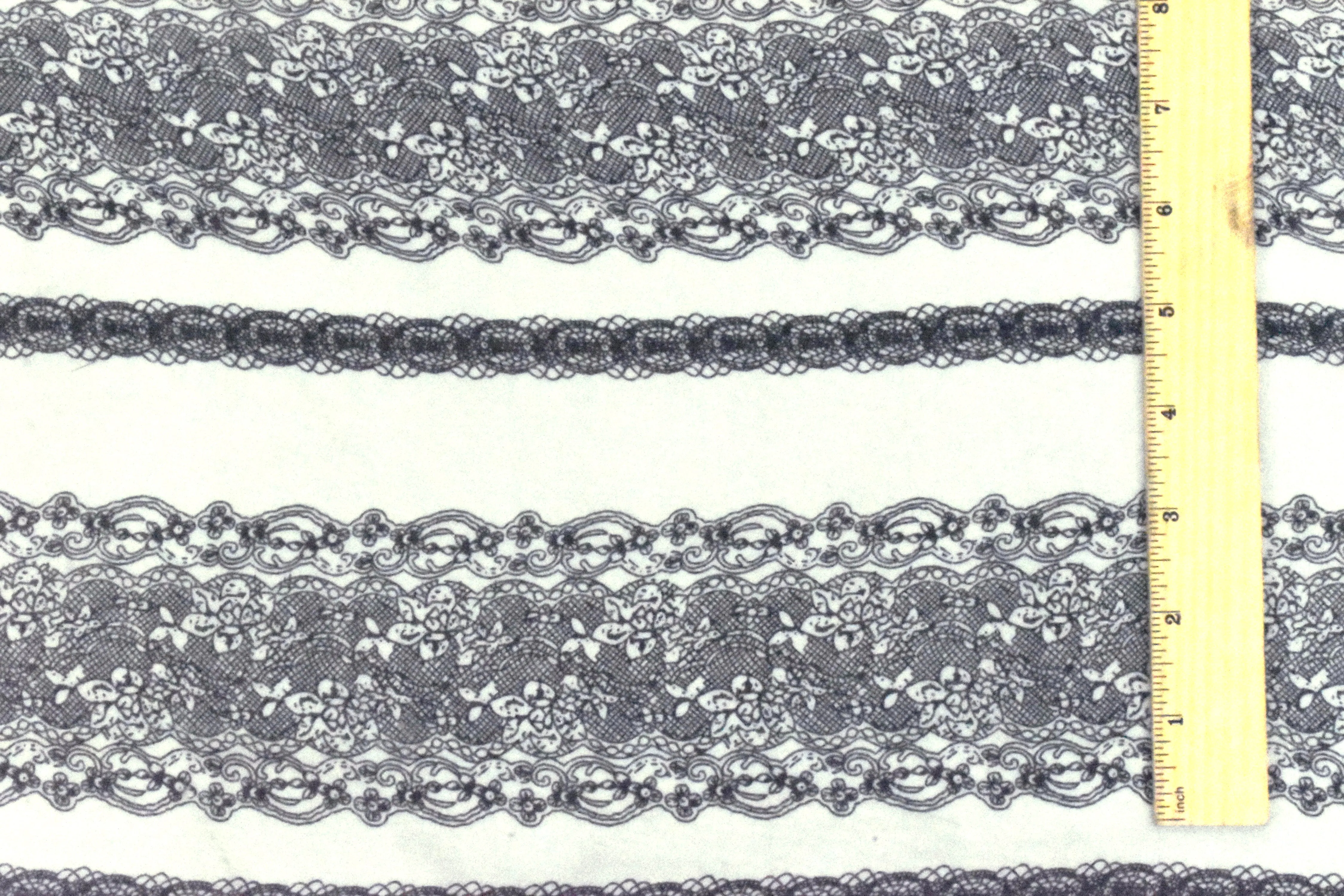 Ivory-Black Lace Stripe Printed Poly Chiffon Woven Fabric